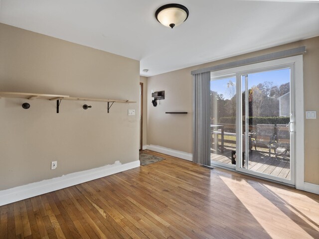 unfurnished room with light hardwood / wood-style flooring