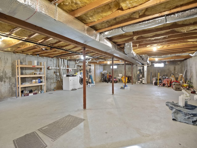 basement featuring separate washer and dryer