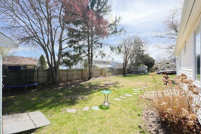 885 Sandwich Rd, Hatchville, MA 02536 - view of yard featuring fence and a trampoline