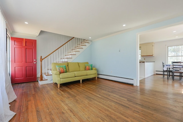 885 Sandwich Rd, Hatchville, MA 02536 - living area featuring a baseboard radiator, stairs, crown molding, and hardwood / wood-style floors