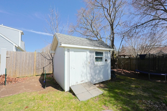 885 Sandwich Rd, Hatchville, MA 02536 - view of shed featuring a trampoline and fence