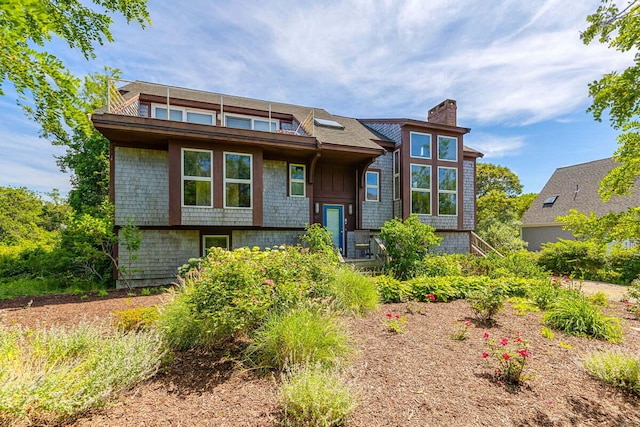 63 Swift Ln, Brewster, MA 02631 - view of front of home featuring a chimney
