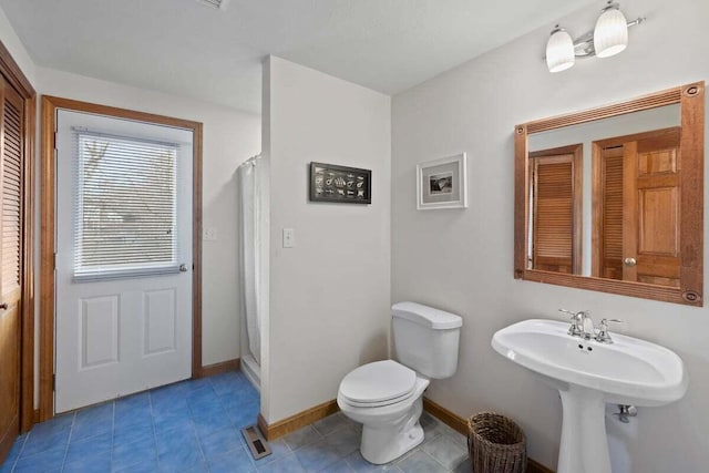 63 Swift Ln, Brewster, MA 02631 - full bathroom with curtained shower, tile patterned flooring, and a closet