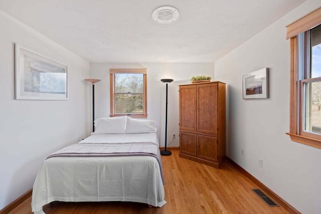 63 Swift Ln, Brewster, MA 02631 - bedroom with light wood-type flooring and baseboards