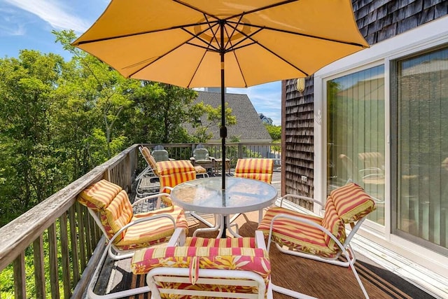 63 Swift Ln, Brewster, MA 02631 - balcony with outdoor dining area