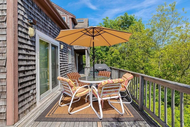 63 Swift Ln, Brewster, MA 02631 - wooden deck with outdoor dining area