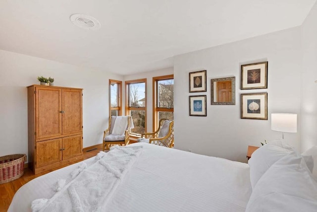 63 Swift Ln, Brewster, MA 02631 - bedroom featuring wood finished floors and baseboards