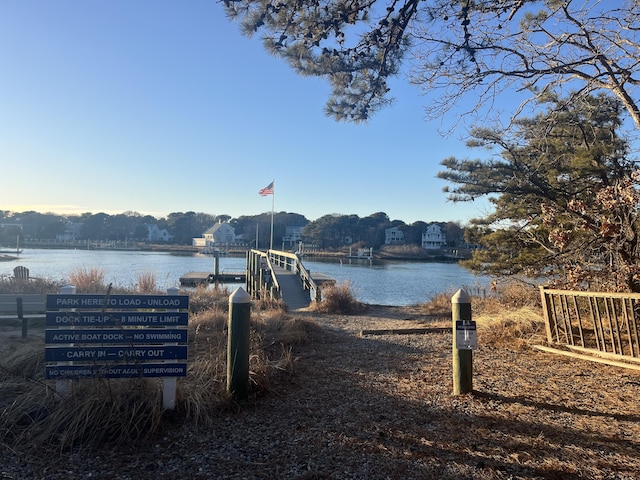 64 Manitoba Rd, Mashpee, MA 02649 - dock area featuring a water view