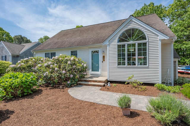 64 Manitoba Rd, Mashpee, MA 02649 - view of front of home with a shingled roof