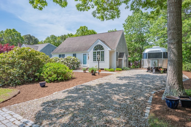 64 Manitoba Rd, Mashpee, MA 02649 - view of front facade featuring gravel driveway