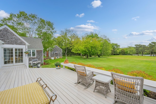 350 Plum St, West Barnstable, MA 02668 - wooden deck with a yard, an outdoor structure, area for grilling, and view of scattered trees