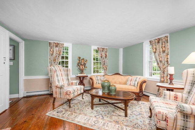 350 Plum St, West Barnstable, MA 02668 - living area featuring a baseboard heating unit, hardwood / wood-style flooring, and healthy amount of natural light