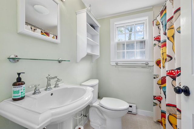 350 Plum St, West Barnstable, MA 02668 - bathroom with a baseboard heating unit, a shower with shower curtain, and ornamental molding