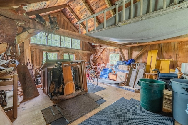 350 Plum St, West Barnstable, MA 02668 - misc room featuring wood walls, plenty of natural light, lofted ceiling, and hardwood / wood-style floors