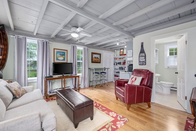 350 Plum St, West Barnstable, MA 02668 - living room featuring light wood-style floors, healthy amount of natural light, baseboard heating, a ceiling fan, and a wood ceiling with exposed beams