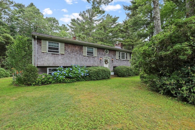 566 County Rd, Pocasset, MA 02559 - raised ranch featuring a chimney and a front yard