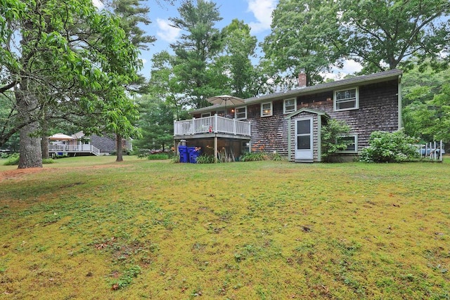 566 County Rd, Pocasset, MA 02559 - view of green lawn featuring a wooden deck