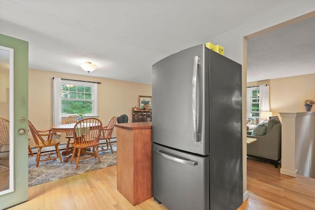 566 County Rd, Pocasset, MA 02559 - kitchen featuring freestanding refrigerator and light wood-style flooring