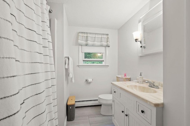 566 County Rd, Pocasset, MA 02559 - full bath featuring baseboard heating, vanity, and a shower with curtain
