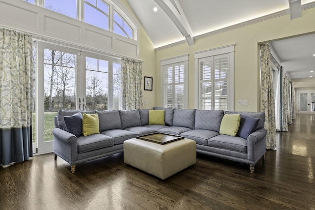 5 Jakes Ln, Brewster, MA 02631 - living room with plenty of natural light, beamed ceiling, and dark wood-style floors