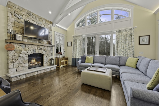 5 Jakes Ln, Brewster, MA 02631 - living room with beam ceiling, wood finished floors, a fireplace, baseboards, and high vaulted ceiling