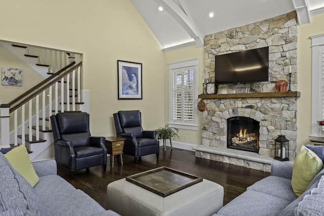 5 Jakes Ln, Brewster, MA 02631 - living area featuring a stone fireplace, baseboards, wood finished floors, beamed ceiling, and stairway