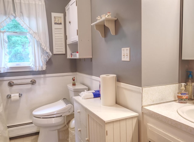 103 Moco Rd, West Barnstable, MA 02668 - half bath with vanity and a baseboard radiator