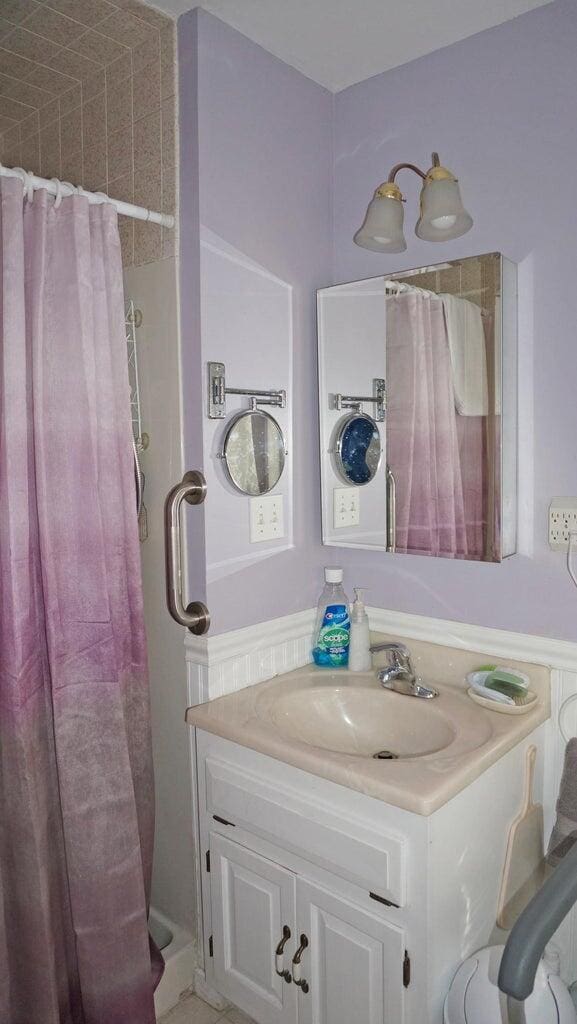 103 Moco Rd, West Barnstable, MA 02668 - bathroom featuring vanity and a shower with curtain