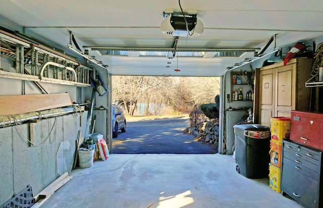 103 Moco Rd, West Barnstable, MA 02668 - garage featuring a garage door opener