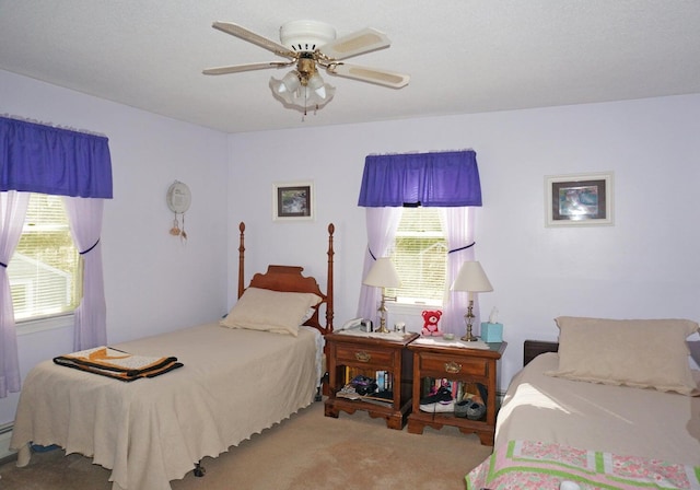 103 Moco Rd, West Barnstable, MA 02668 - carpeted bedroom with a ceiling fan