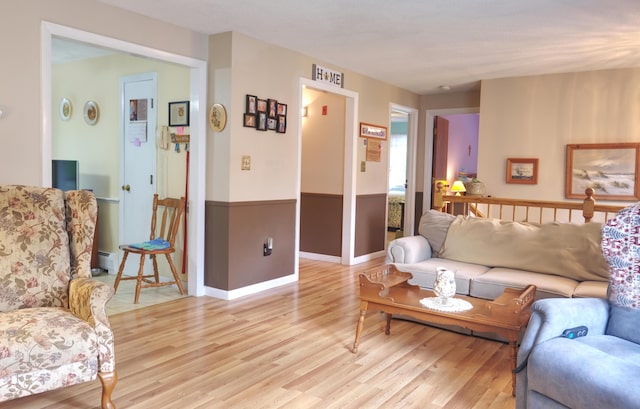 103 Moco Rd, West Barnstable, MA 02668 - living area featuring light wood-type flooring and a baseboard radiator