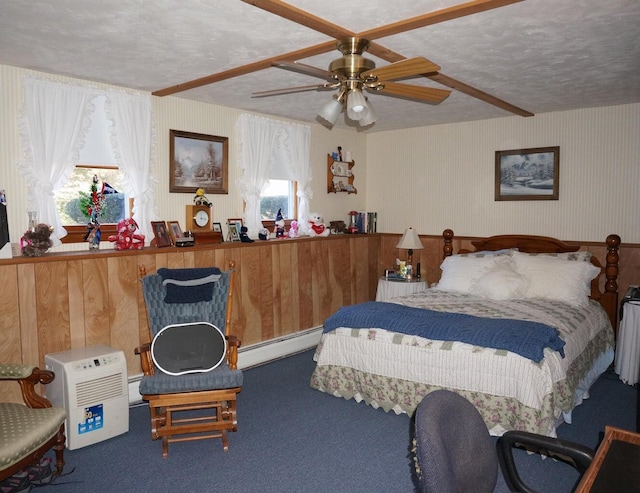 103 Moco Rd, West Barnstable, MA 02668 - carpeted bedroom featuring a baseboard radiator, wallpapered walls, a textured ceiling, a ceiling fan, and a baseboard heating unit