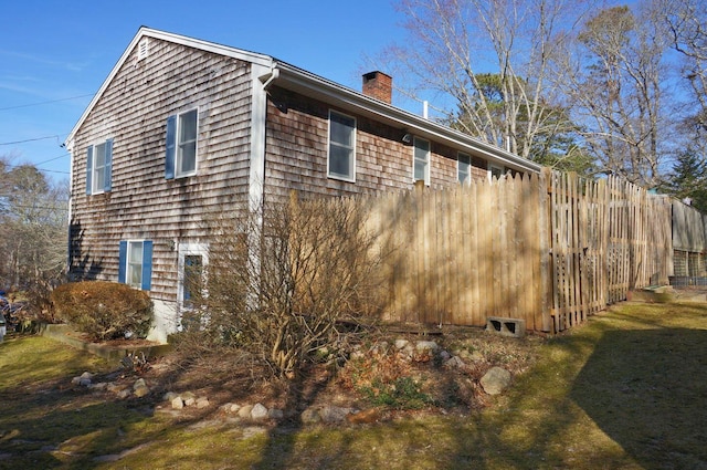 103 Moco Rd, West Barnstable, MA 02668 - view of side of property with a chimney