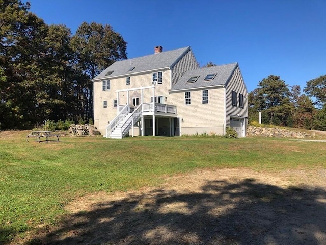 341 Service Rd, Sandwich, MA 02563 - rear view of property with a garage, a wooden deck, stairway, a chimney, and a yard
