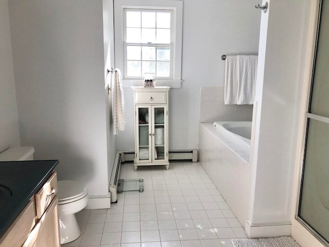 341 Service Rd, Sandwich, MA 02563 - full bathroom featuring a garden tub, vanity, toilet, baseboard heating, and tile patterned floors