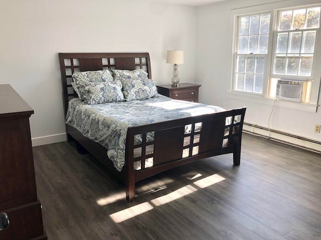 341 Service Rd, Sandwich, MA 02563 - bedroom with baseboards, baseboard heating, wood finished floors, and cooling unit