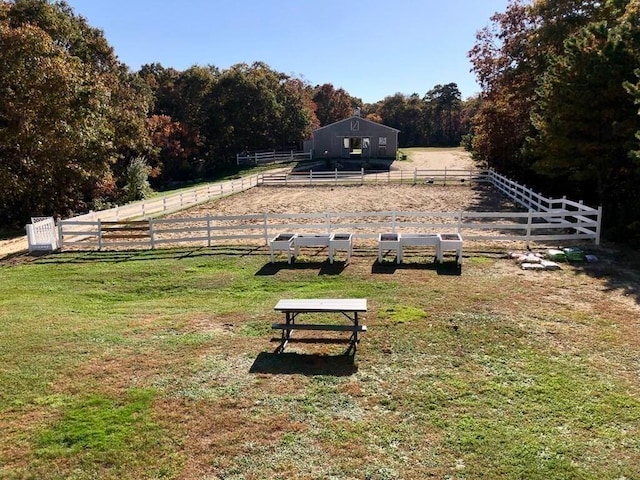 341 Service Rd, Sandwich, MA 02563 - view of yard with fence and a wooded view