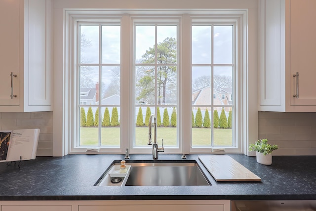 72 Woodside Dr, East Falmouth, MA 02536 - kitchen with a healthy amount of sunlight, a sink, and white cabinets