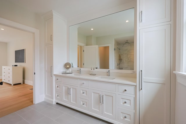 72 Woodside Dr, East Falmouth, MA 02536 - bathroom with a walk in shower, tile patterned floors, double vanity, and a sink