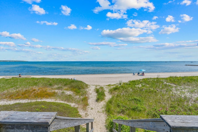 view of water feature with a beach view