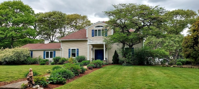 3 Wolf Rd, Buzzards Bay, MA 02532 - traditional-style house with a front lawn