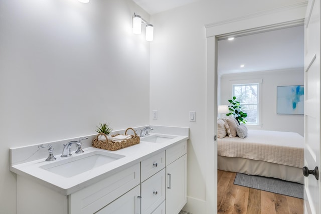 213 N Falmouth Hwy Unit 5B, North Falmouth, MA 02556 - full bath featuring a sink, wood finished floors, and ensuite bathroom
