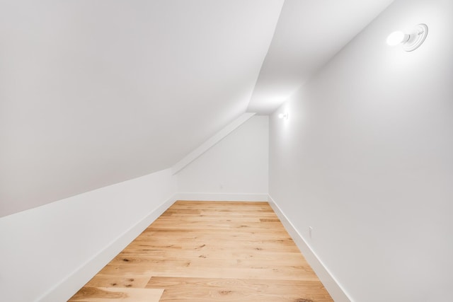213 N Falmouth Hwy Unit 5B, North Falmouth, MA 02556 - bonus room featuring baseboards, light wood finished floors, and vaulted ceiling