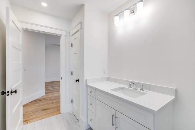 213 N Falmouth Hwy Unit 5B, North Falmouth, MA 02556 - bathroom featuring vanity, recessed lighting, baseboards, and wood finished floors
