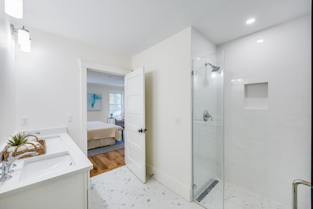 213 N Falmouth Hwy Unit 5B, North Falmouth, MA 02556 - ensuite bathroom featuring a stall shower, recessed lighting, and double vanity