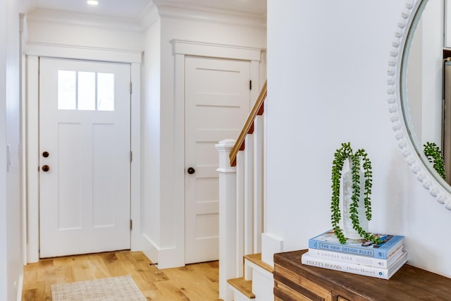 213 N Falmouth Hwy Unit 5B, North Falmouth, MA 02556 - foyer featuring stairway, light wood finished floors, ornamental molding, and recessed lighting