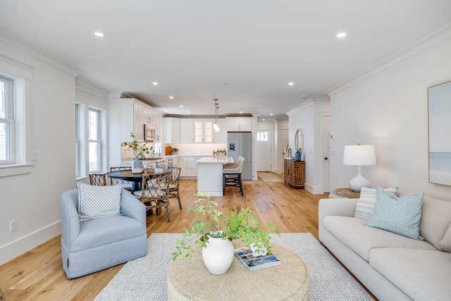 213 N Falmouth Hwy Unit 5B, North Falmouth, MA 02556 - living area with plenty of natural light, ornamental molding, recessed lighting, light wood-style flooring, and baseboards