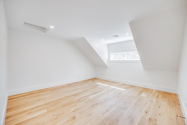 213 N Falmouth Hwy Unit 5B, North Falmouth, MA 02556 - additional living space featuring wood finished floors, baseboards, recessed lighting, and lofted ceiling