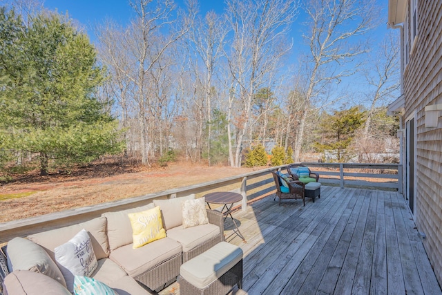 wooden deck featuring an outdoor hangout area