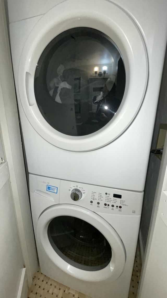 40 Brant Rock Rd, Mashpee, MA 02649 - washroom featuring stacked washer / dryer